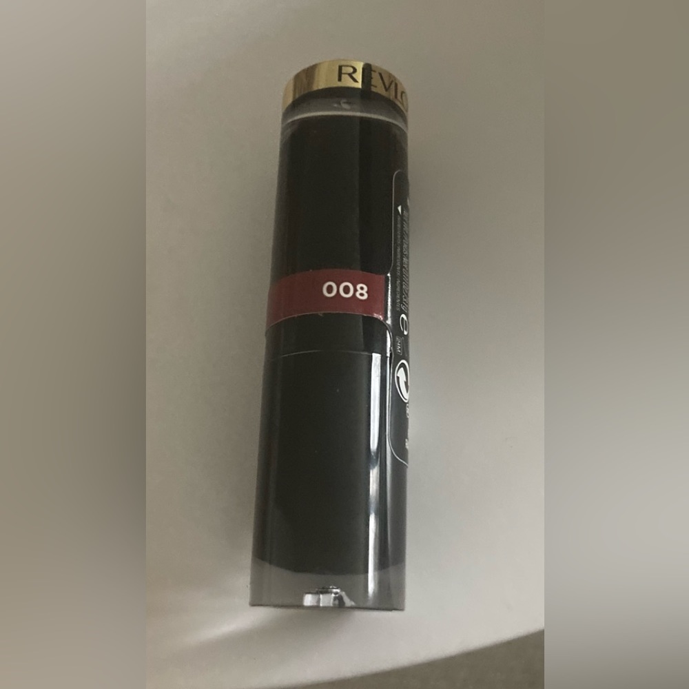 Brand new Revlon Glass Shine Rum Raisin 008 Lipstick